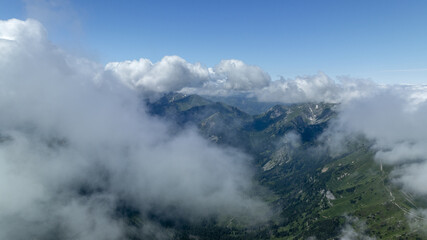 Fototapeta premium clouds in foreground, blue sky with white clouds in background