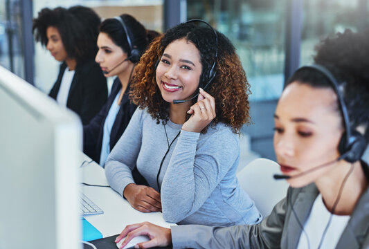 Girl, office and portrait in call center for customer support, consulting and outbound telemarketing for sales. Woman, happy and headphones for communication, listening and contact us for advice.