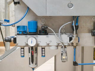 industrial pneumatic system with pressure gauge, installation in a industrial factory. Pneumatic...