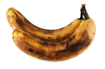 Darkened overripe bananas isolated on a white background. Blackened banana peel. Spoiled banana. © Viktor