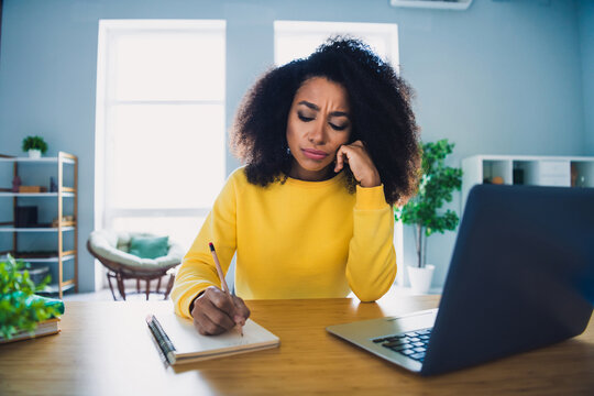 Photo of bired tired lovely cute woman sitting table working modern office workspace
