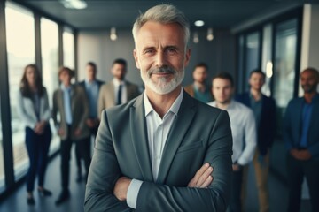 Fototapeta premium Portrait of a mature businessman posing confidently in office