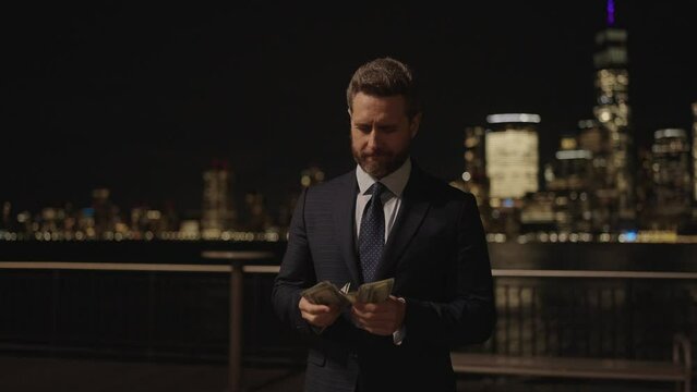 Businessman count money outdoor. Businessman invest money in business. Successful business brings money. Successful business man investor. Financial investment. Successful business. US banknotes