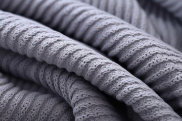 A close-up shot of a luxurious bath towel with a textured weave.