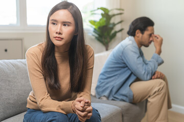 Obraz premium Breakup and depressed, asian young quarrel couple love fight relationship in trouble. Different people are emotion angry. Argue wife has expression upset with husband. Problem of family people.