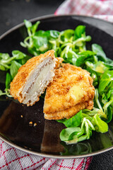 chicken meat cutlet cordon bleu snack ham, cheese fresh meal food on the table copy space food background rustic top view