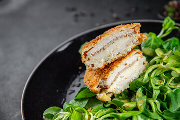 chicken meat cutlet cordon bleu snack ham, cheese fresh meal food on the table copy space food background rustic top view