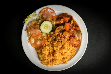 Caribbean chicken stew with yellow rice