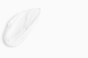 A smear of cream on a light background