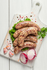 raw kupaty, traditional Georgian sausages, raw sausages, with spices and herbs, Georgian cuisine,