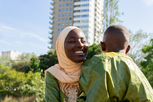 Joyful moment between mother and son in the park