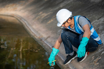 Environmental engineers inspect water quality,Bring water to the lab for testing,Check the mineral content in water and soil,Check for contaminants in water sources.