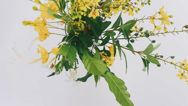 vase, yellow flowers, plain white table, floral arrangement, decoration, elegant, simplicity, minimalistic, beauty, home decor, interior design, floral centerpiece, bright, vibrant, fresh, bloom, peta