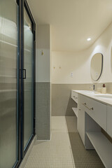 In addition to the sink, bathroom furniture can also include cabinets, shelves, and drawers