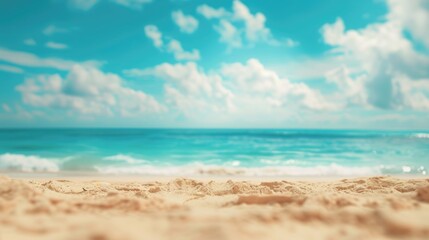 Obraz premium A serene view of the ocean from a sandy beach, perfect for travel or vacation photography