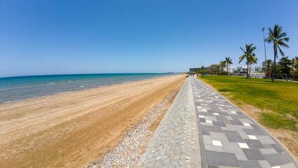 Photography of golden beach in Muscat, Oman during spring day