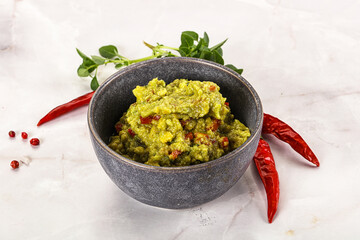 Guacamole with avocado, tomato and chili