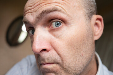 Funny portrait of a not young man.