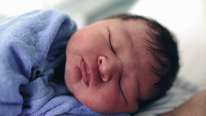 Sleeping Newborn on First Day of Life - Peaceful Close-Up After Childbirth