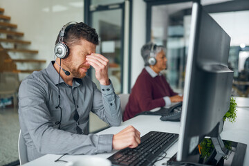 Call center, depression or businessman with headache in office overwhelmed by fear, fail or crm mistake. Anxiety, vertigo or consultant frustrated by telecom workload stress, pressure or faq crisis