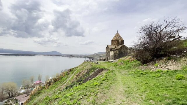view of the Sevanavank Monastery and chapel overlooking famous Sevan lake at spring sunny day. Travel and tourist destinations of Armenia