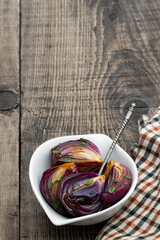Fototapeta premium Delicious caramelized onions in balsamic vinegar with thyme