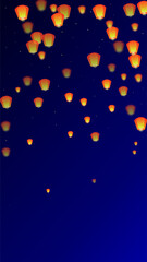 Sky lanterns floating in the night sky.