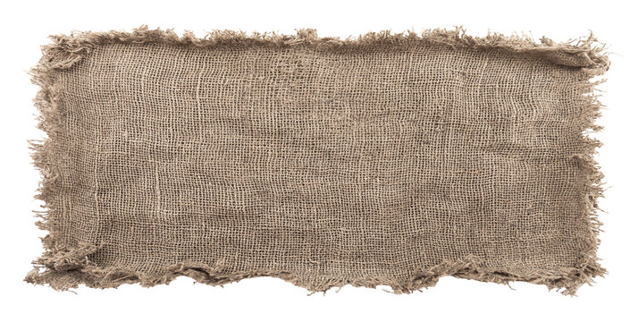 Burlap texture. A piece of torn burlap on a white background. Canvas. Packing material