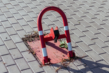 Roadblock mounted on a cobblestone street.