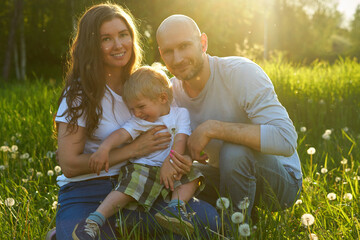 portrait of happy family outdoors