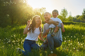 Fototapeta premium portrait of happy family outdoors