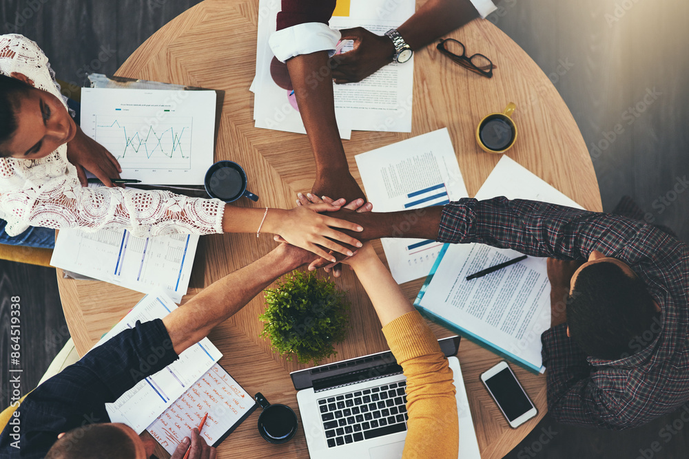 Aufkleber above, office and employees with pile of hands in meeting for teamwork, collaboration and brainstorm