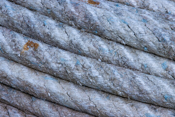 close up detail of old worn ropes from fishing boats