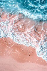 Fototapeta premium Beautiful beach with pastel pink sand and blue ocean waves creating a dreamy coastal scene