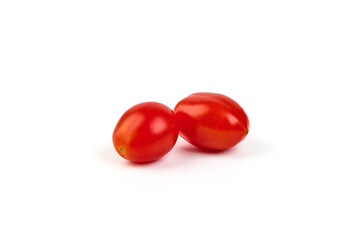 Fresh cherry tomatoes, isolated on white background.