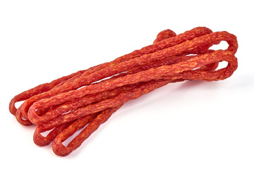 Kabanos thin dry sausage, snacks for beer, isolated on the white background.