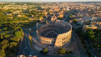 Fototapete Kolosseum Aerial view of the historic Colosseum and surrounding buildings in Rome, Italy  © Wirestock