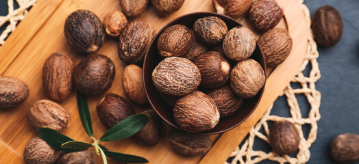 Bowl of shea nuts on table