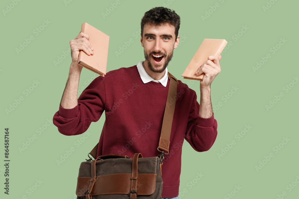 Canvas Prints male student with books on green background