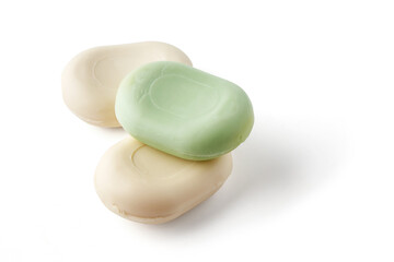 Pieces of white and green toilet soap isolated on a white background. Hygiene and sanitation