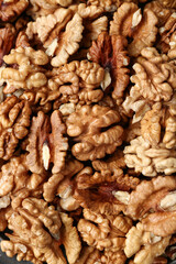 Tasty shelled walnuts as background