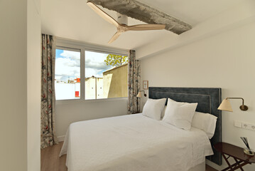  Beds with upholstered headboards, nightstands with built-in storage, and wardrobes with smart organization systems are good choices 2