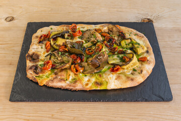 Vegetarian, a healthy and colorful option that includes a variety of fresh vegetables such as peppers, mushrooms, onions, tomatoes and olives 2