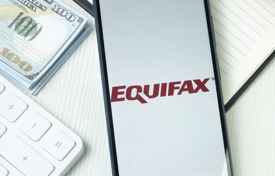 New York, USA - 21 June 2024: Equifax Logo on Phone Screen, Company Icon