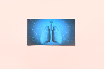 Paper lungs on beige background