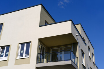 fragments multi-storey office and residential buildings in European city with reflective glass facades, modern high-rise office buildings and residential towers