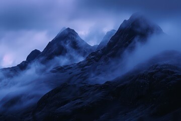 Obraz premium Moody Blue Mountain Landscape with Misty Peaks for Nature and Travel Marketing