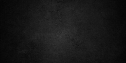 Abstract black stone wall texture grunge rock surface. dark gray background backdrop. wide panoramic banner. old wall stone for dark black distressed grunge background wallpaper rough concrete wall.