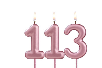Lit birthday candle - Candle number 113 on white background