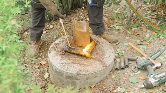 blacksmith working with cutting torch